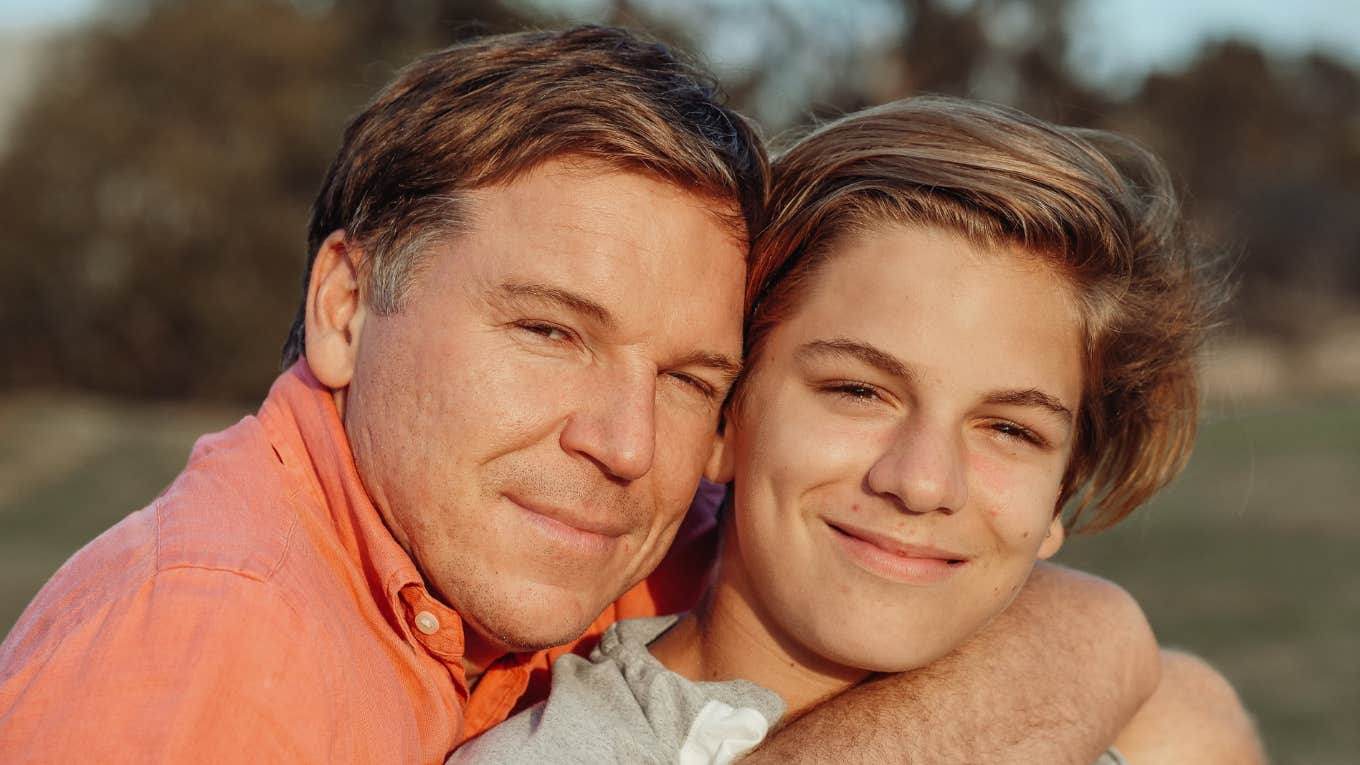 After Overhearing A Private Phone Call, A Dad Writes A Note To His Gay Son Who Hadn't Come Out Yet father and son together