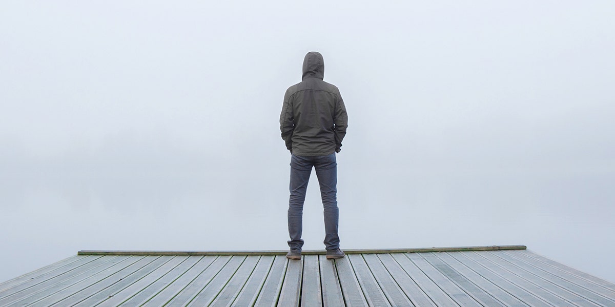 Sad Reasons No Woman Will Ever Marry Me man standing alone on dock