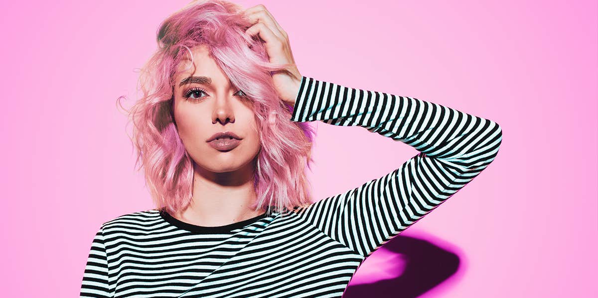 10 Things People With Alpha Personality Types Do woman with pink hair
