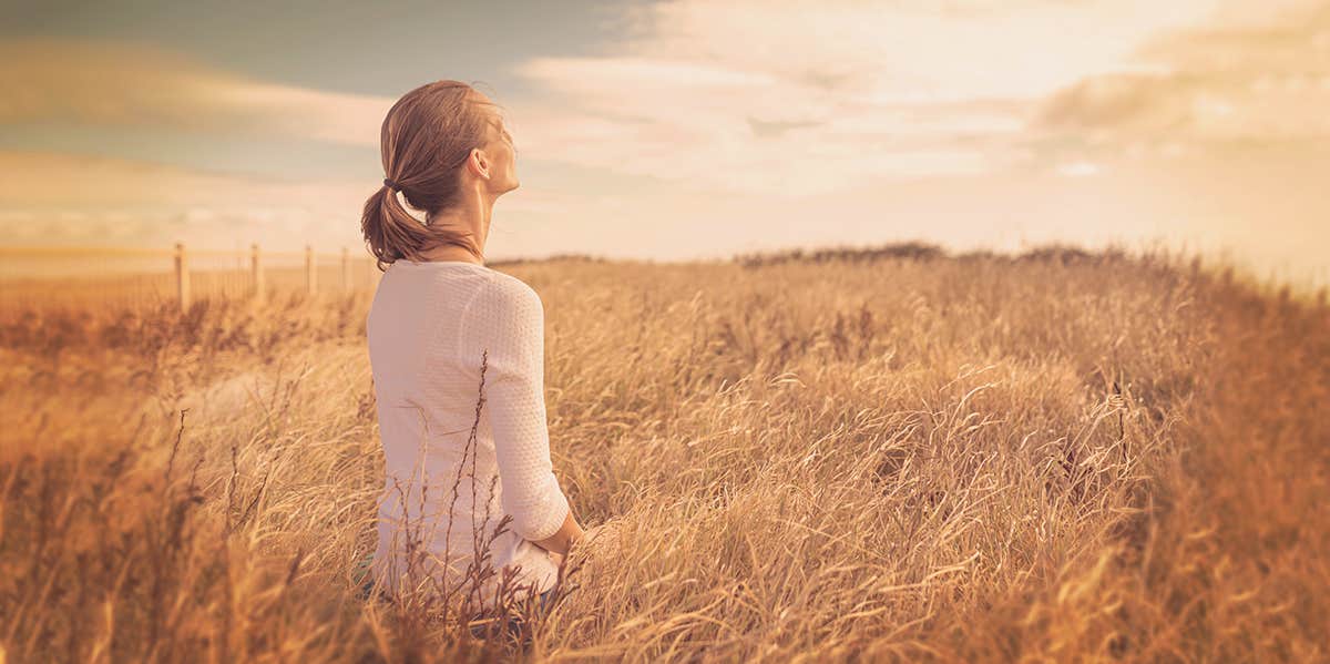 peaceful woman in a field