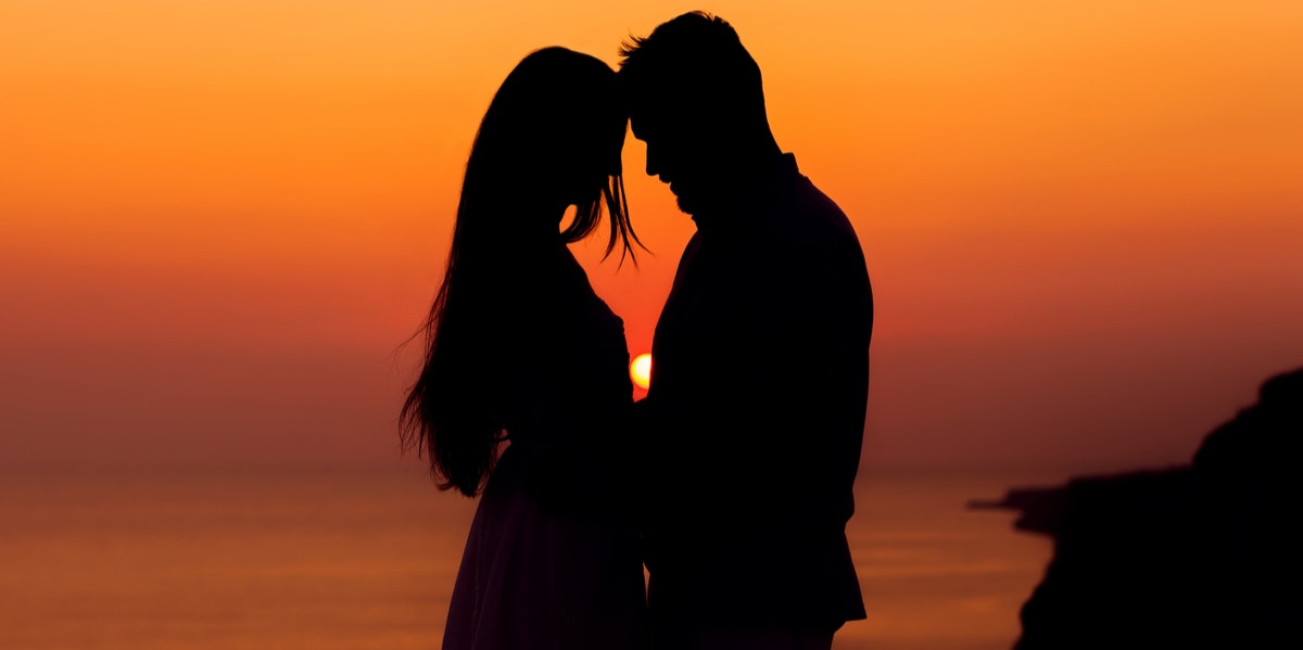 I Am Still In Love With My First Love: 8 Ways To Move On couple in sunset