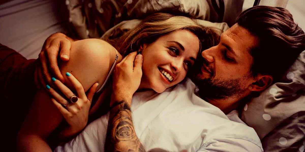 Am I With The Right Person? 10 Ways They'll Love You happy couple hugging and looking into each other's eyes