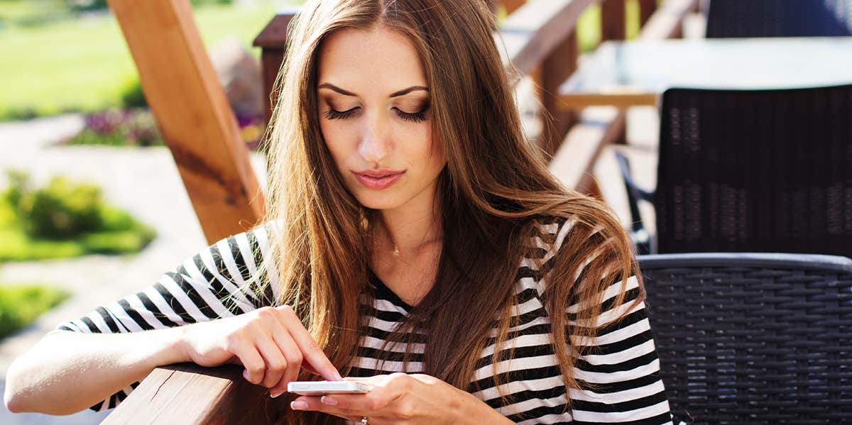 woman texting on phone