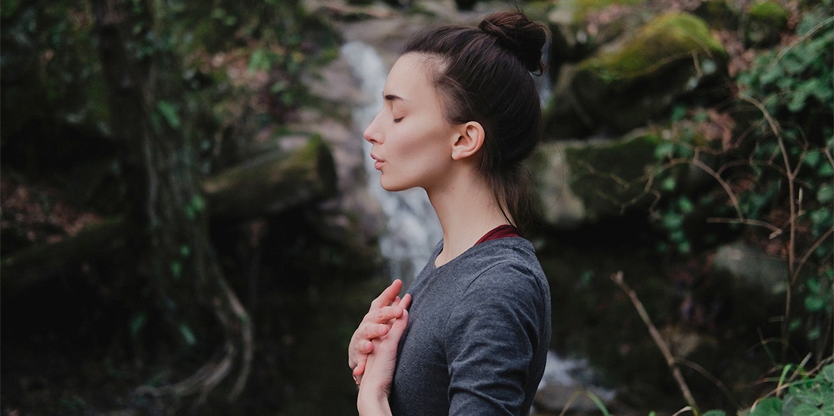 woman doing breathing technique