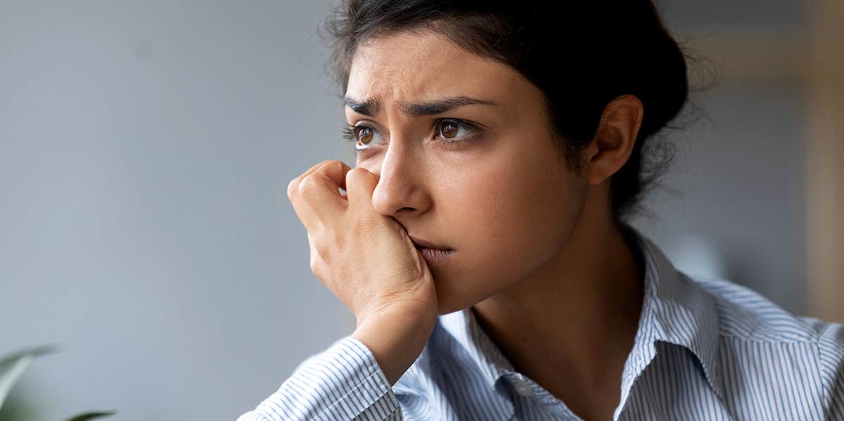 The Food That Can Potentially Help Social Anxiety, According To Research sad woman looking at something