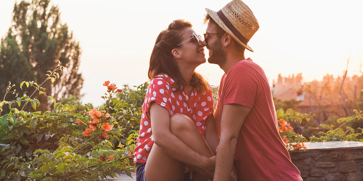 woman and man kissing 