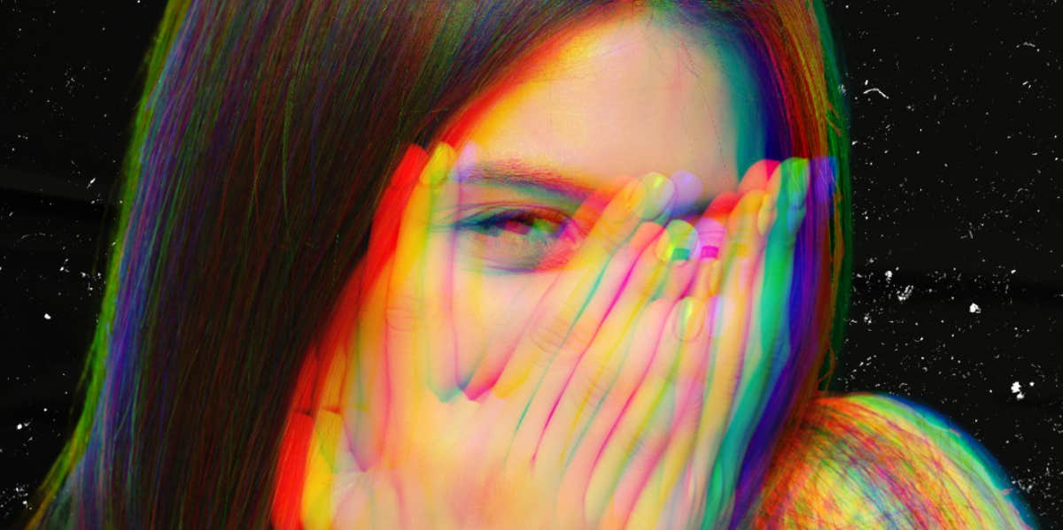 Block Universe Theory: Why Einstein Thought We're Already Dead woman peeking through fingers