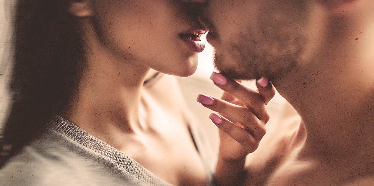 The Biggest Sign You're A Love Junkie couple about to kiss