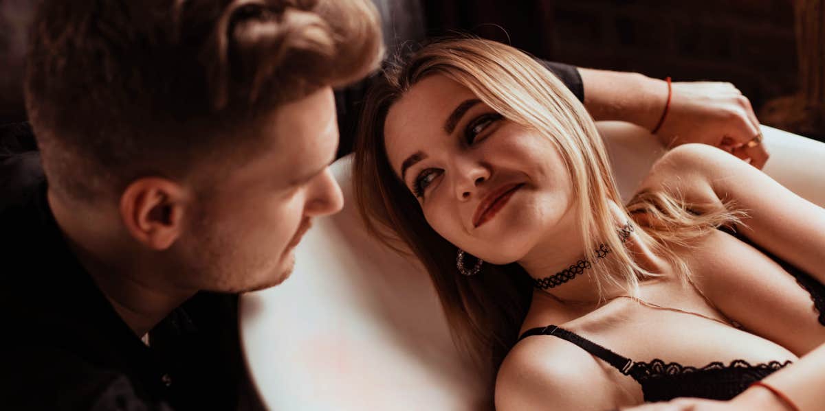 If You Answer 'Yes' To These 7 Questions, You're Addicted To Love woman cuddling with man