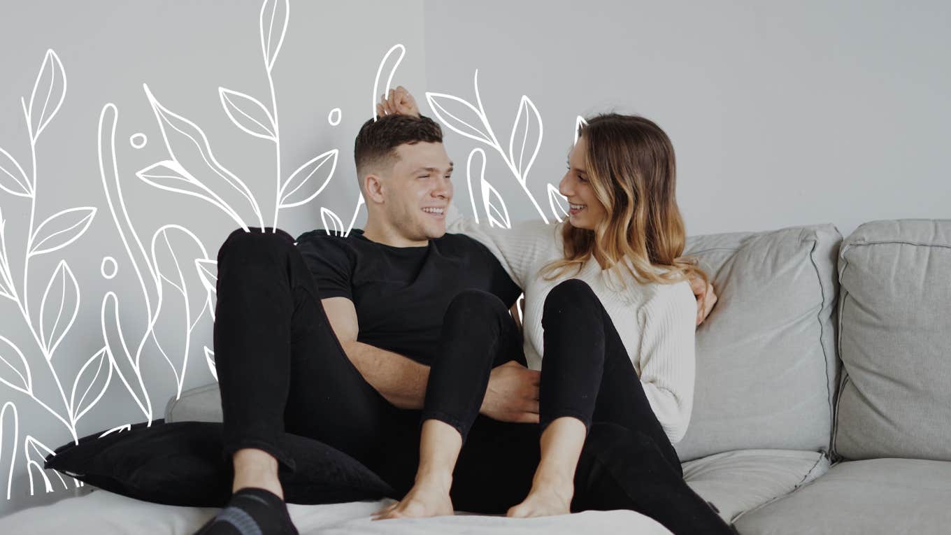 Happy couple sitting on couch