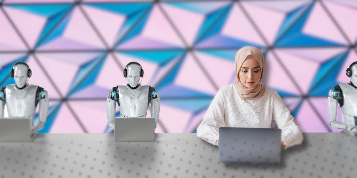 woman working on laptop next to robots working on laptops