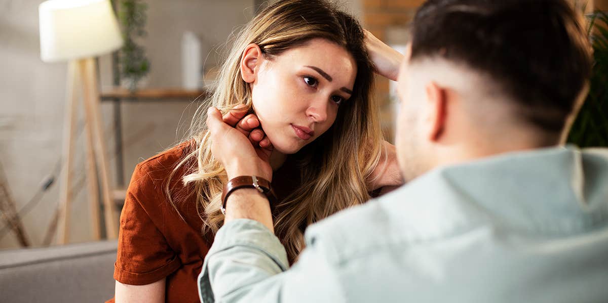 woman looking sternly at husband