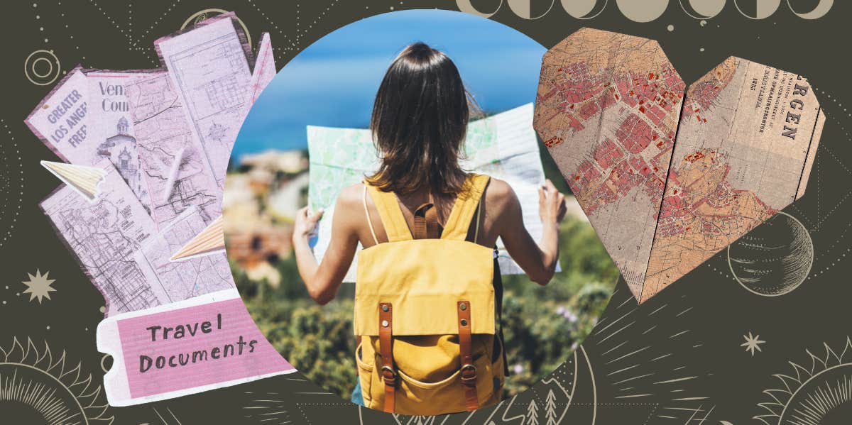 woman holding a map and travel documents