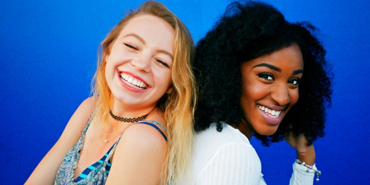 two women laughing