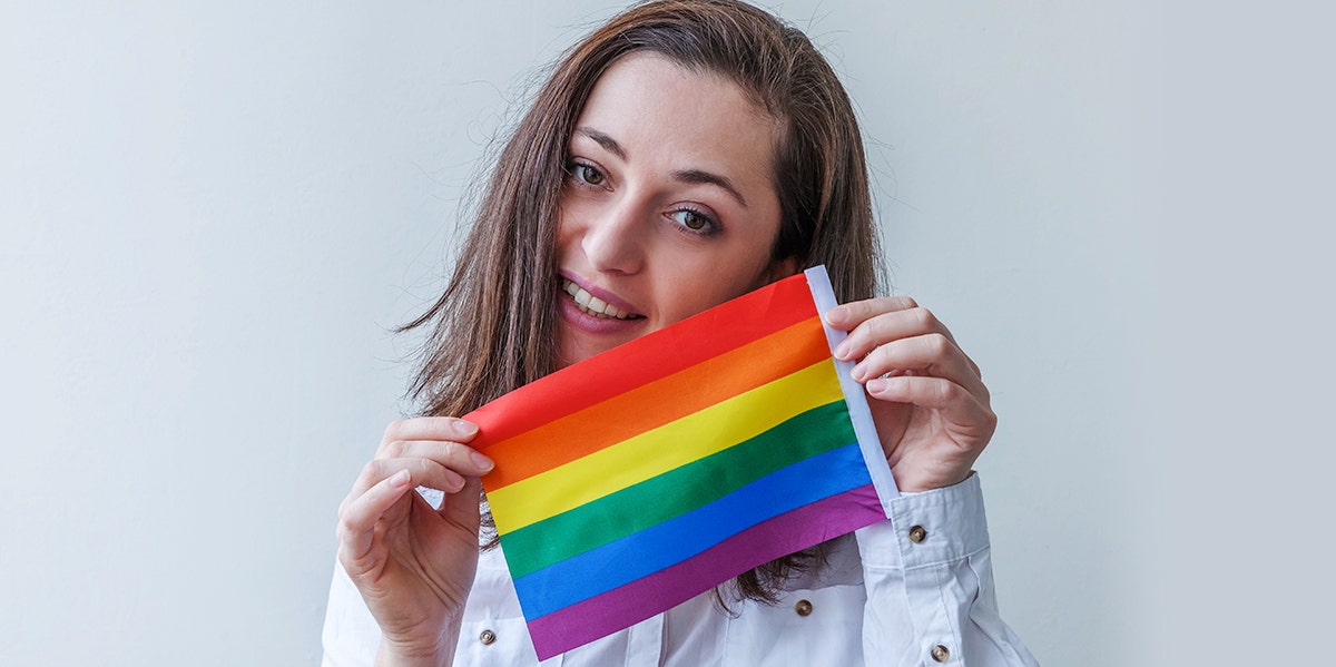 woman with lgbtq pride flag