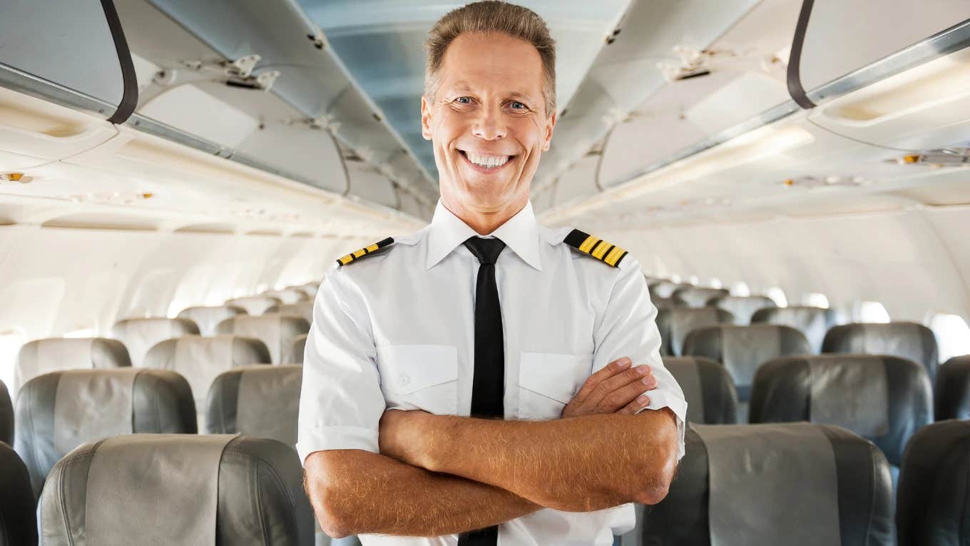Aviation expert standing in a plane