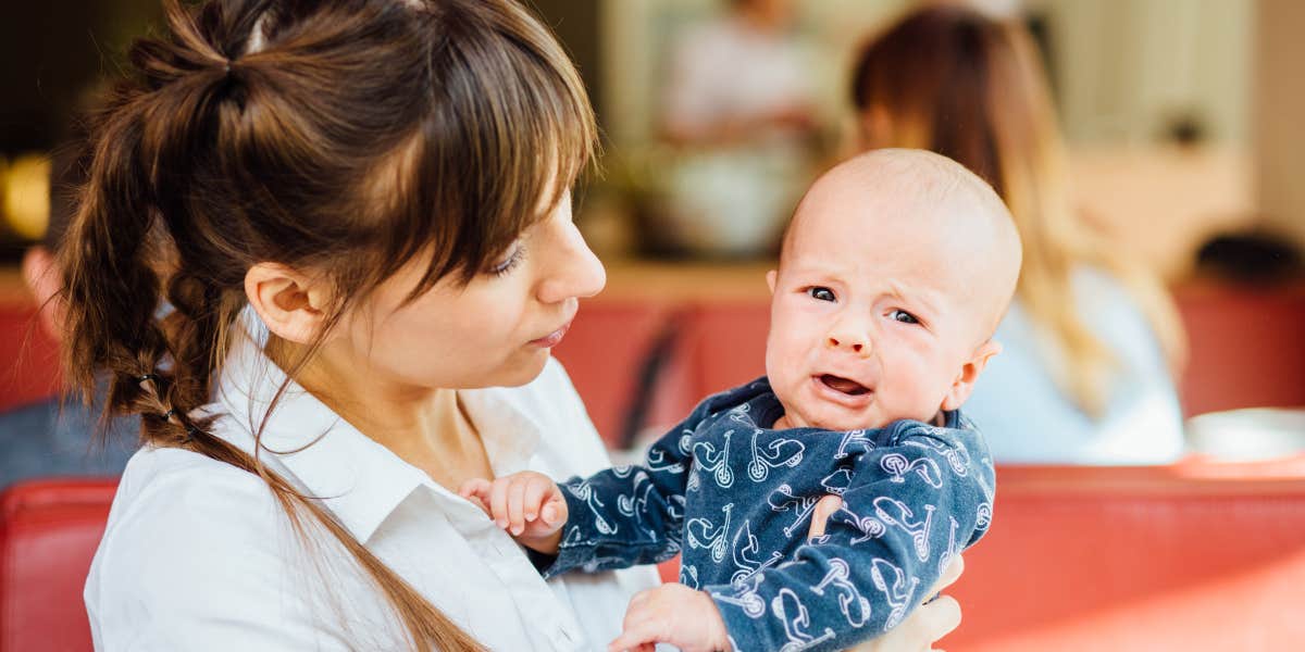 Baby crying in restaurant