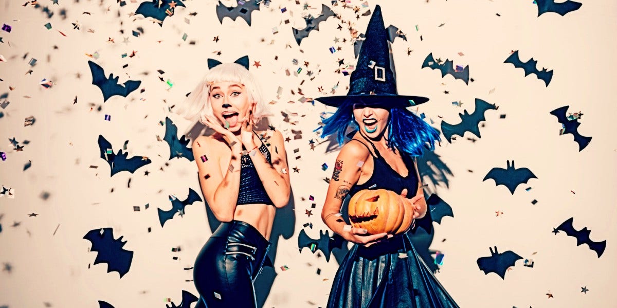 two badass women in Halloween costumes