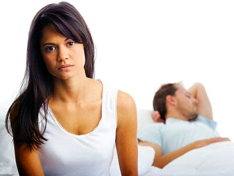 unhappy couple in bed unhappy couple in bed