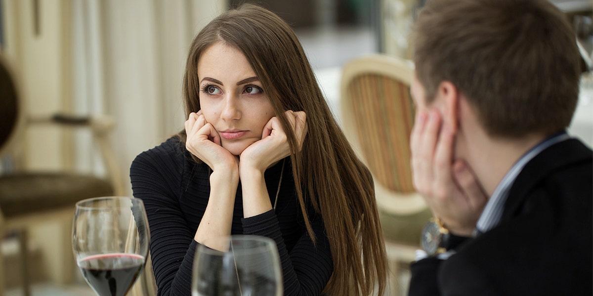 woman and man looking bored on first date