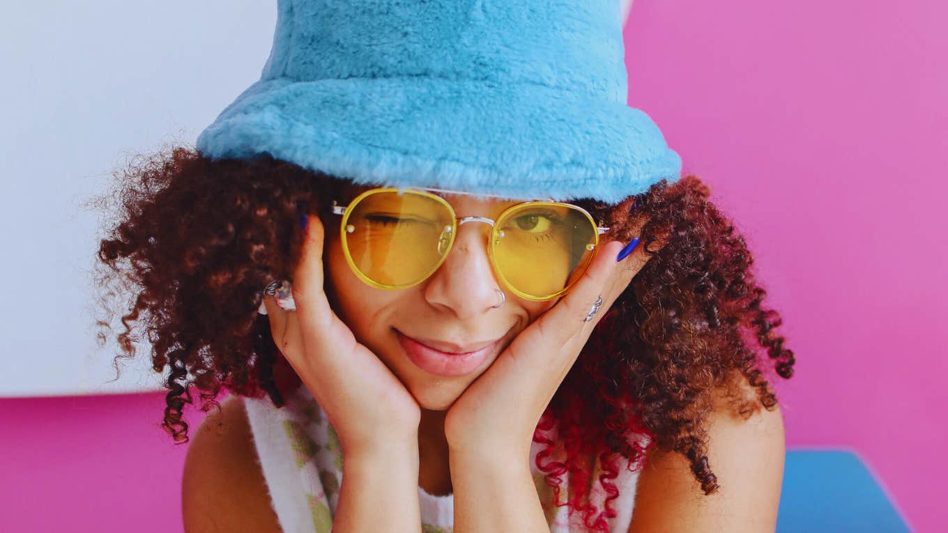 woman in cool hat and glasses