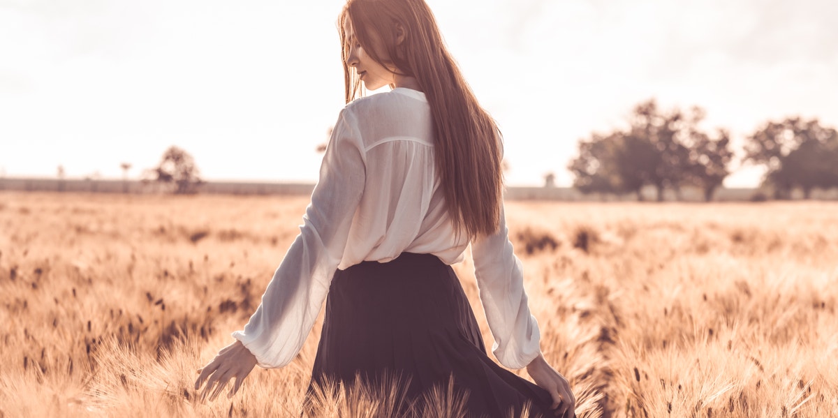 Be Strong Enough To Let Go & Smart Enough To Deserve Better woman walking in field