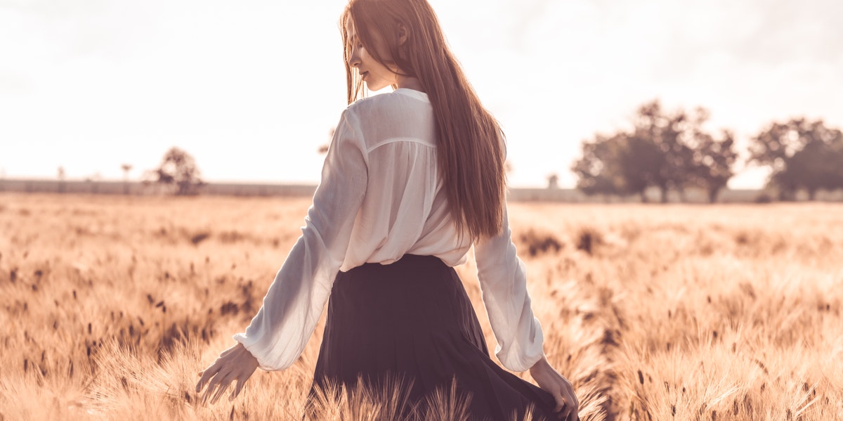 woman walking in field