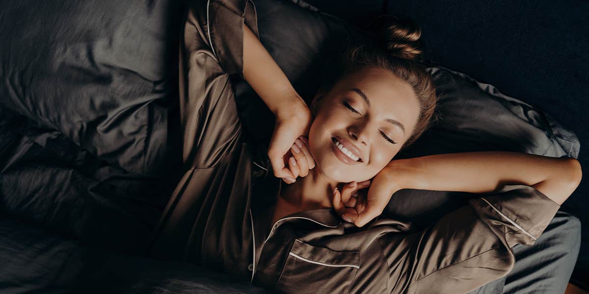 Beauty Sleep Tips To Prevent Wrinkles, Acne, Frizzy Hair & More woman stretching waking up