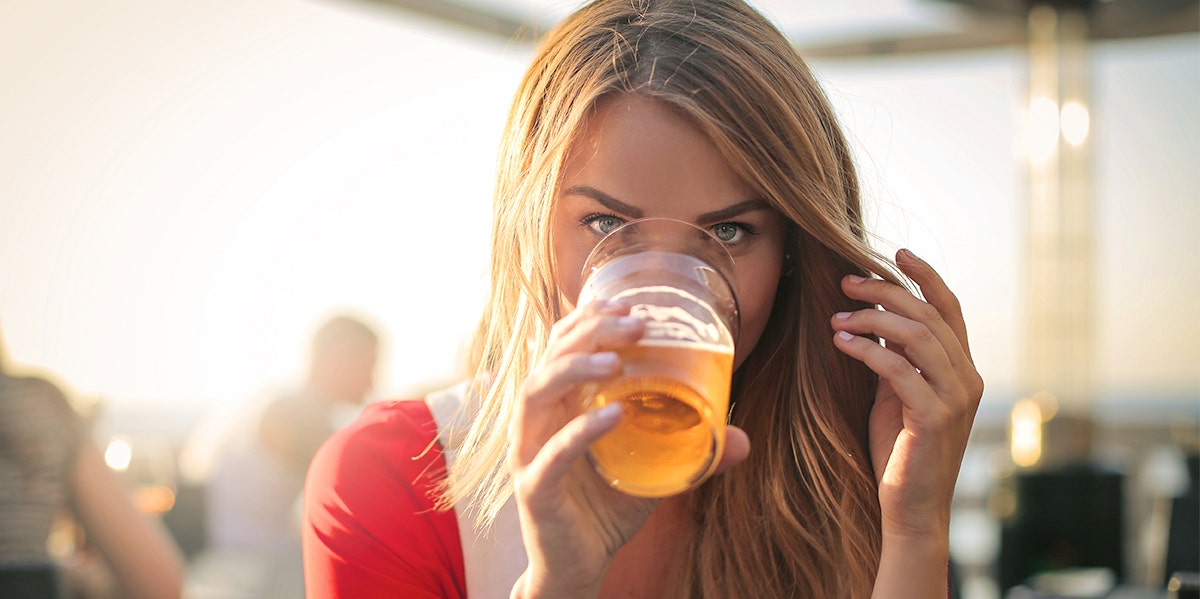 woman drinking beer