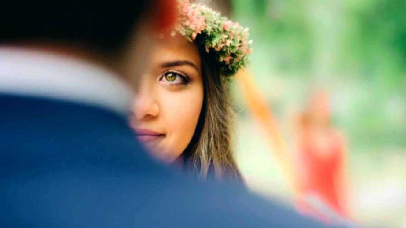 bride looking at groom