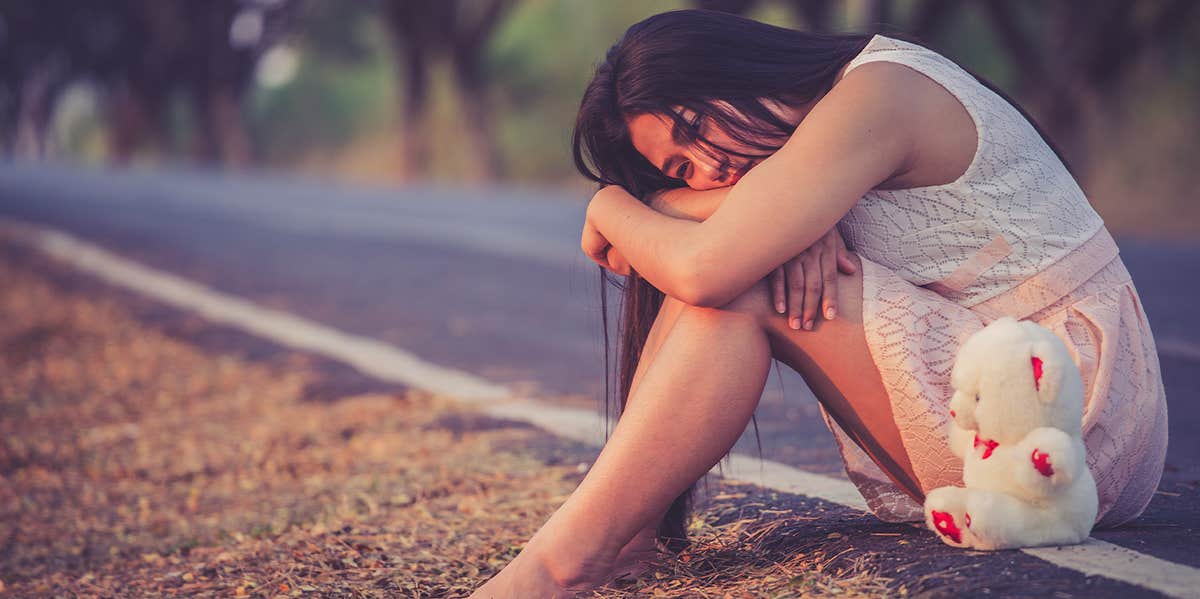 sad woman traumatized from childhood