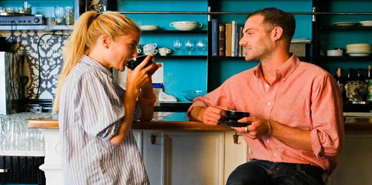 Man and woman being cordial over coffee