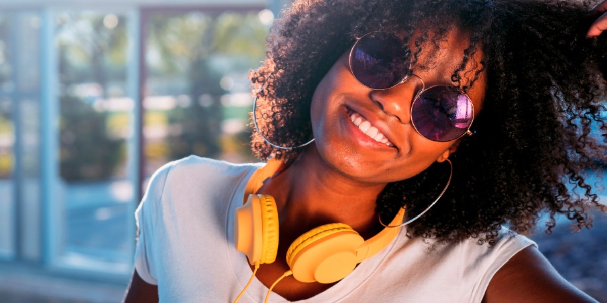 single woman smiling and happy 