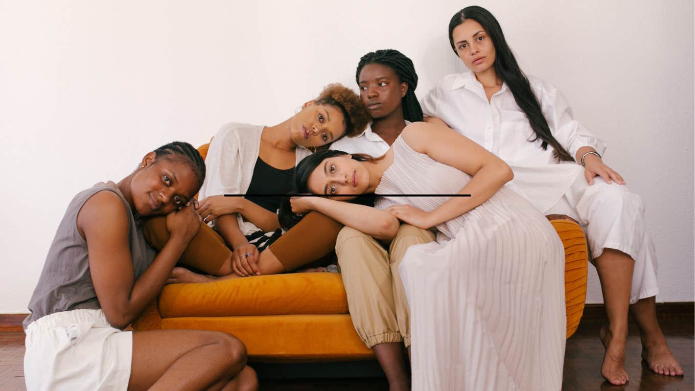 women sitting together on a couch