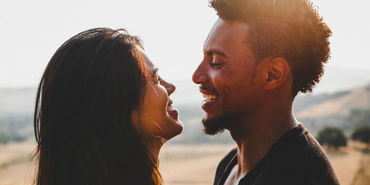 happy couple looking at each other smiling