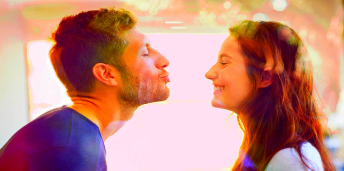 15 Health Benefits Of Kissing – Why Kisses Are Good For You man and woman facing each other about to kiss