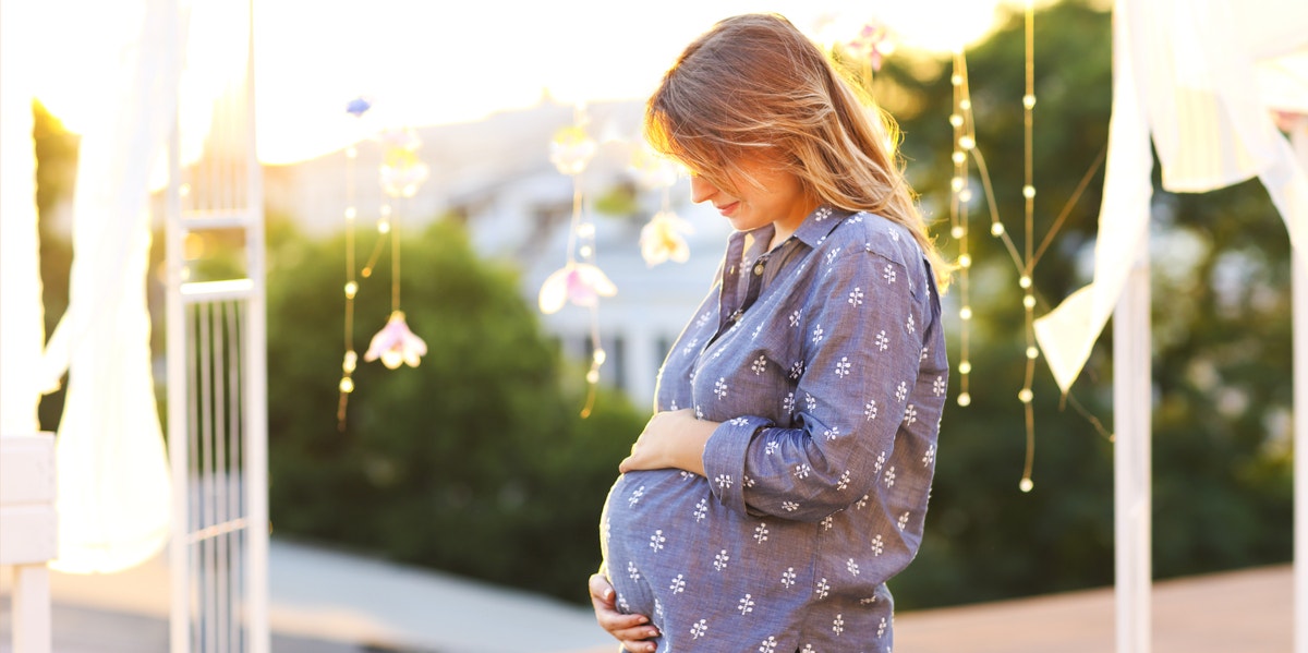 Why Science Says The Best Age To Have Kids Is After 35 pregnant woman