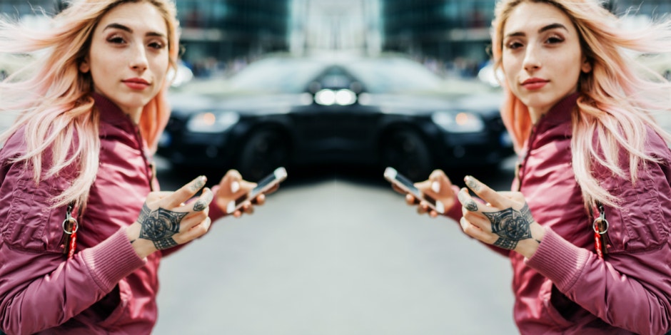 woman listening to songs on her phone