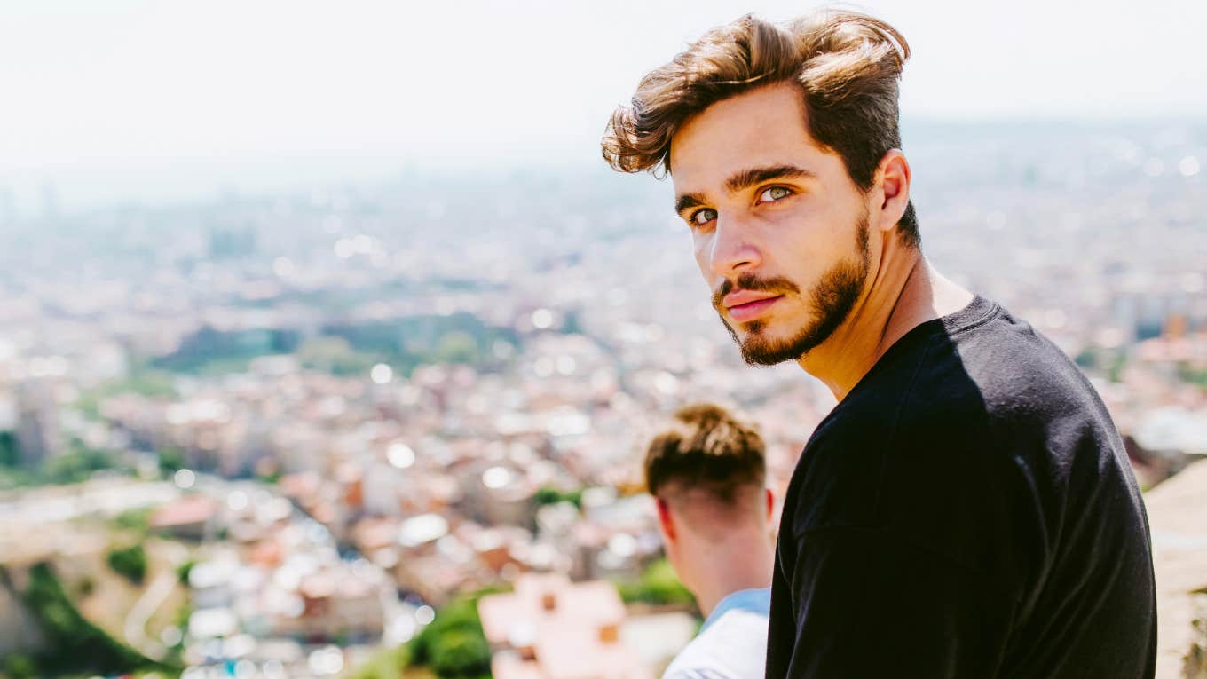 attractive man looking back