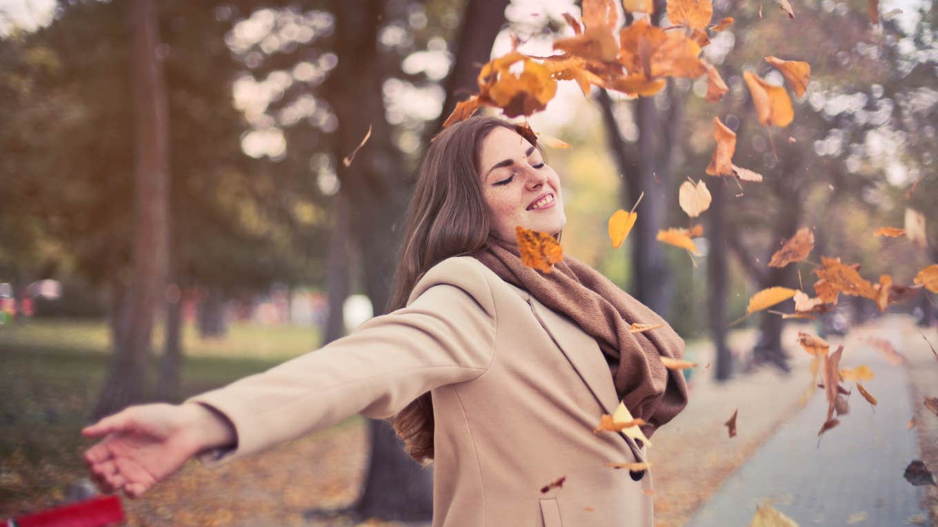 woman enjoying fall weather