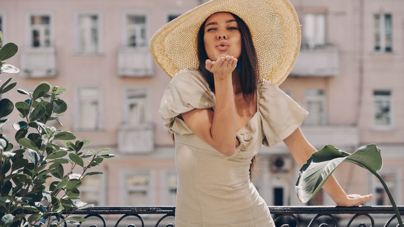 3 Zodiac Signs With The Best Horoscopes On October 6, 2023 woman blowing kisses