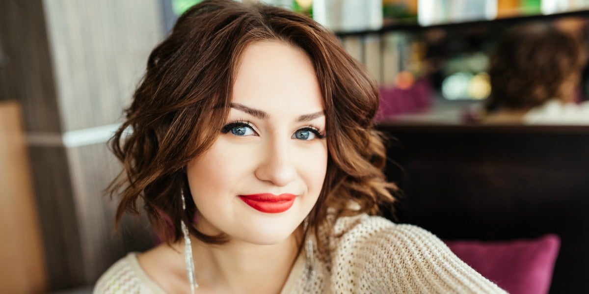 What Your Fave Lip Color Says About Your Personality Type woman with lipstick