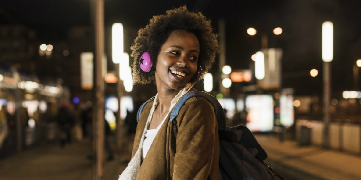 woman listening to songs about moving on