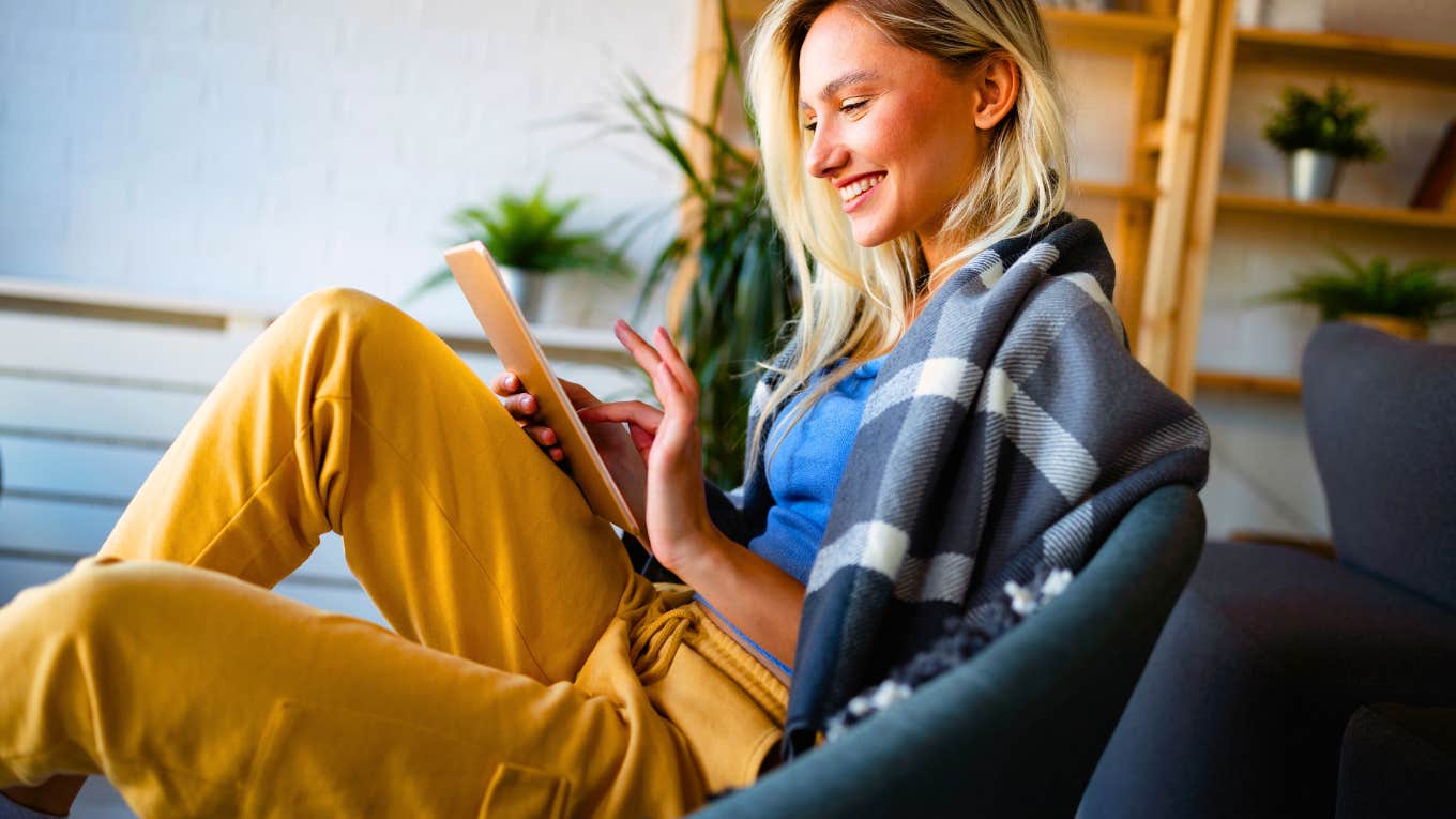Useless Websites To Help You Waste Your Time Online woman having fun online