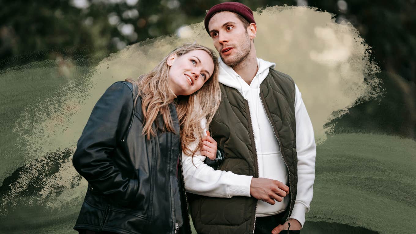 Woman leaning her head on a guy who isn't very interesting