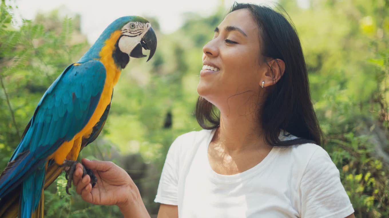 woman with a parrot