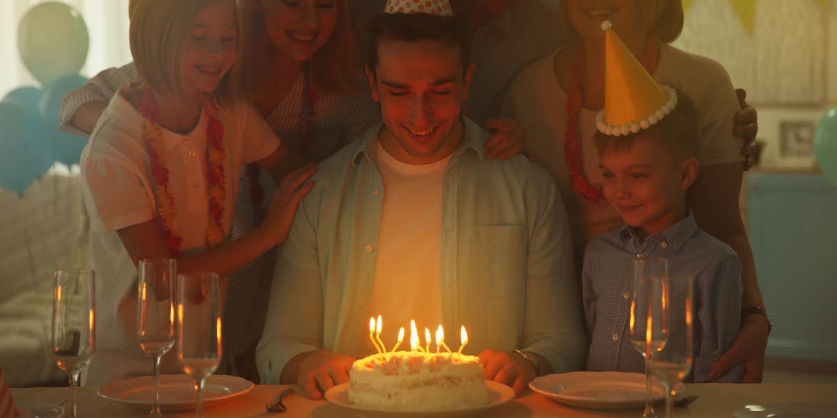 Man with birthday cake