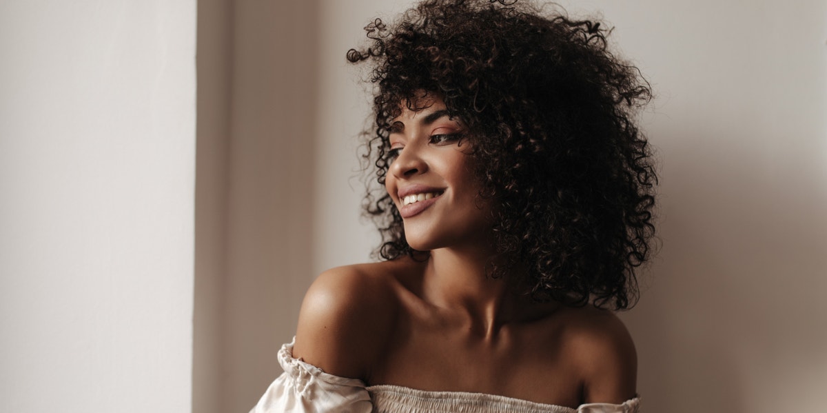 Black. Female. Childfree. woman smiling