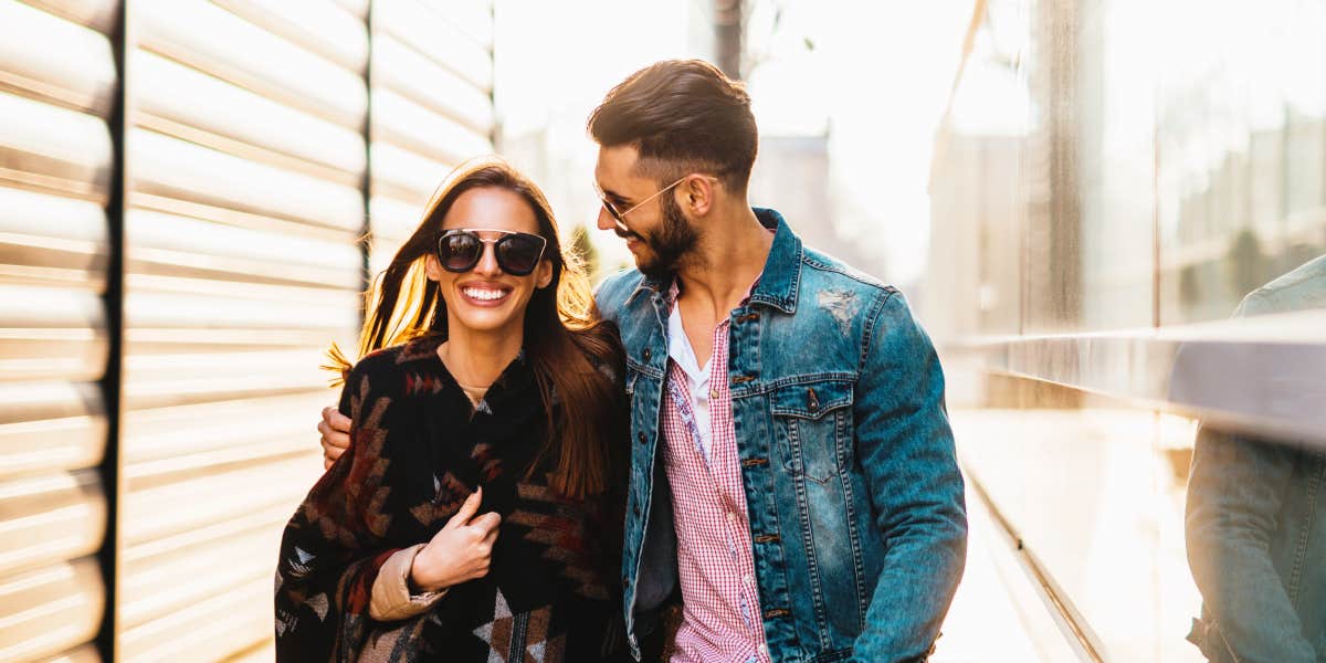 agreements couples make for blissful marriages man and woman walking near a building with a stark metal siding
