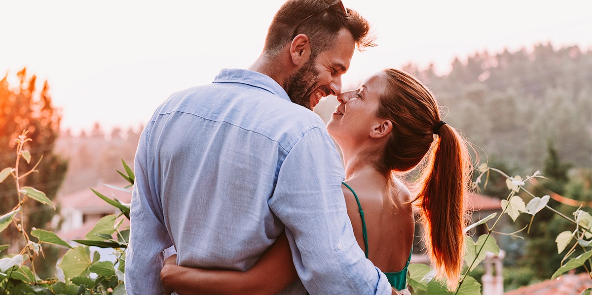 woman and man embracing 